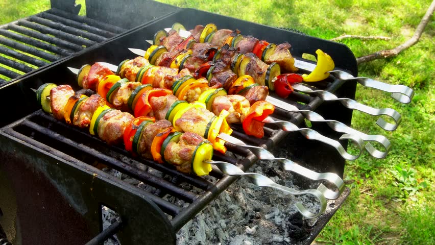 kebabs resting on the BBQ