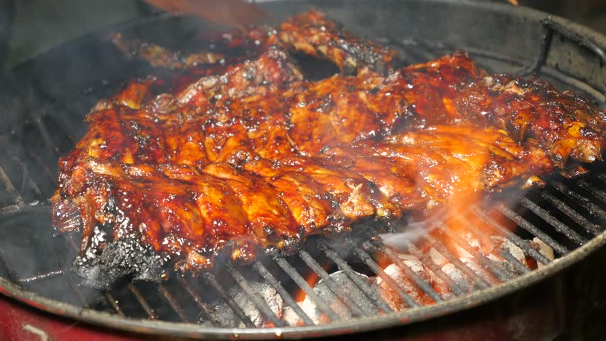 honey glazed ribs resting on the BBQ